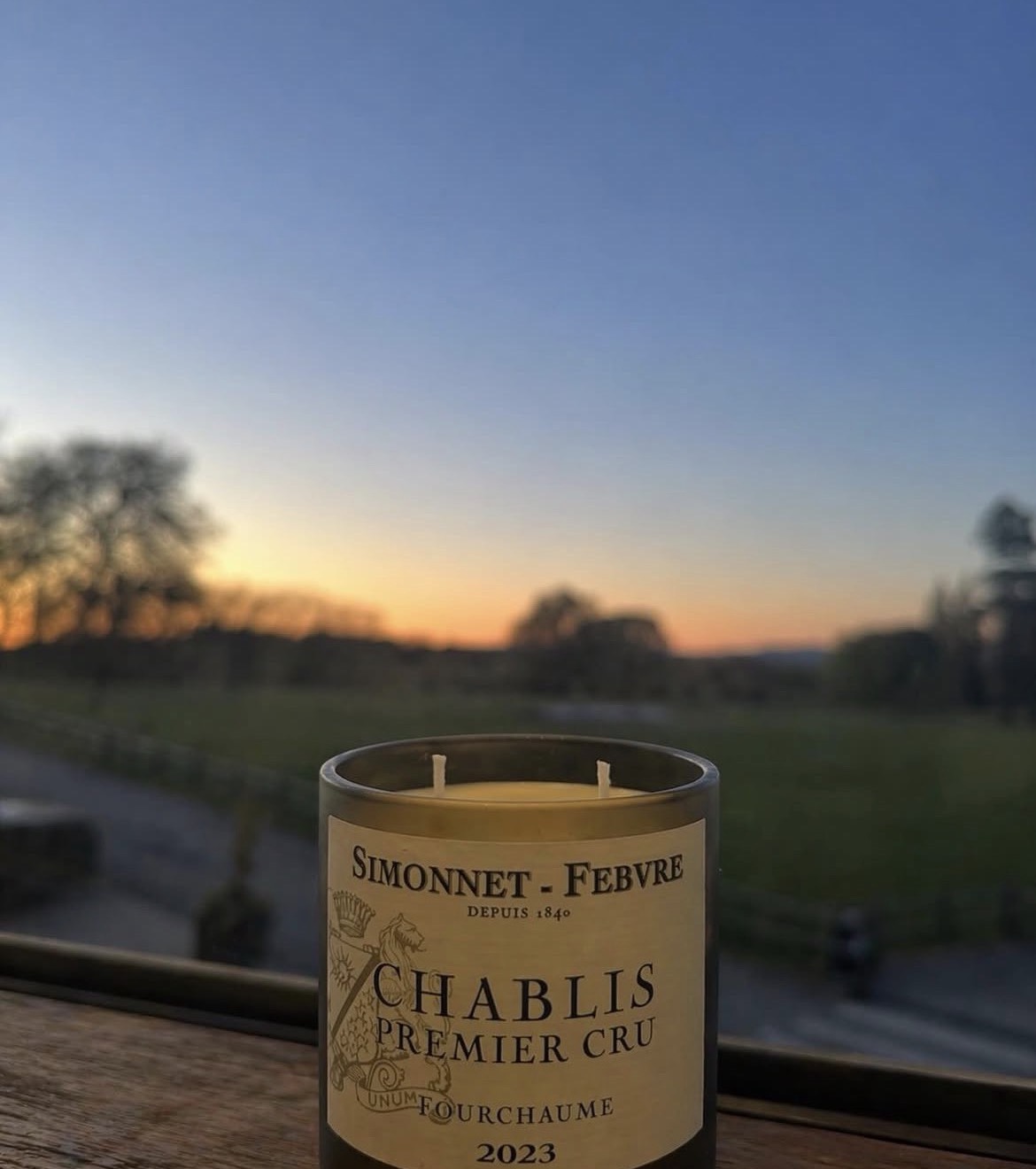 A Bar-Top Burn candle poured into a rescued Chablis bottle